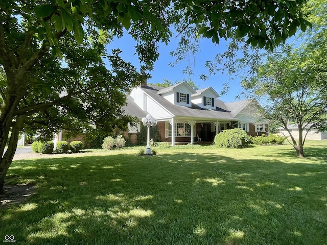 800 Walton Dr, Plainfield, IN 46168 - new england style home featuring a front lawn and brick siding