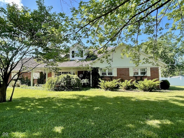 800 Walton Dr, Plainfield, IN 46168 - view of front facade with a front yard and brick siding