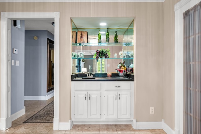115 Jordan Rd, Indianapolis, IN 46217 - indoor wet bar with light tile patterned floors