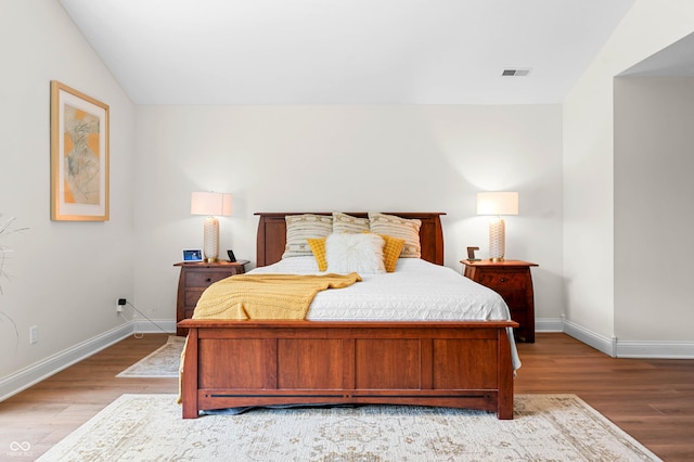 115 Jordan Rd, Indianapolis, IN 46217 - bedroom featuring light wood-style flooring and lofted ceiling