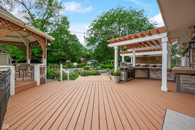 115 Jordan Rd, Indianapolis, IN 46217 - wooden terrace featuring area for grilling, a pergola, an outdoor bar, and a gazebo