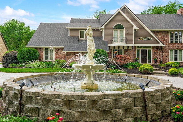 115 Jordan Rd, Indianapolis, IN 46217 - view of front of house featuring brick siding and roof with shingles