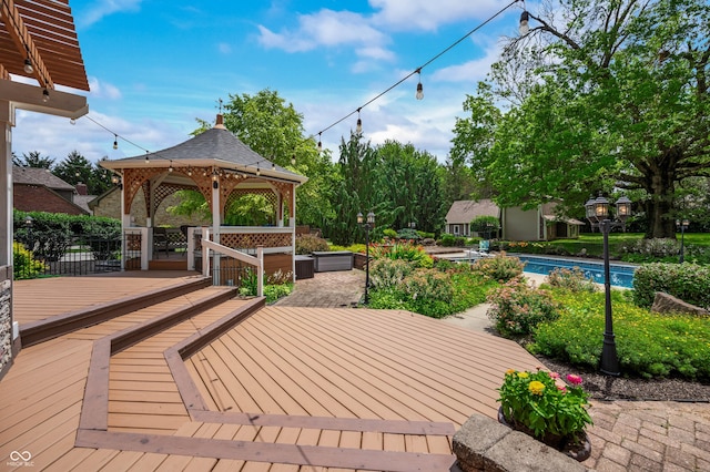 115 Jordan Rd, Indianapolis, IN 46217 - wooden terrace featuring a gazebo and an outdoor pool