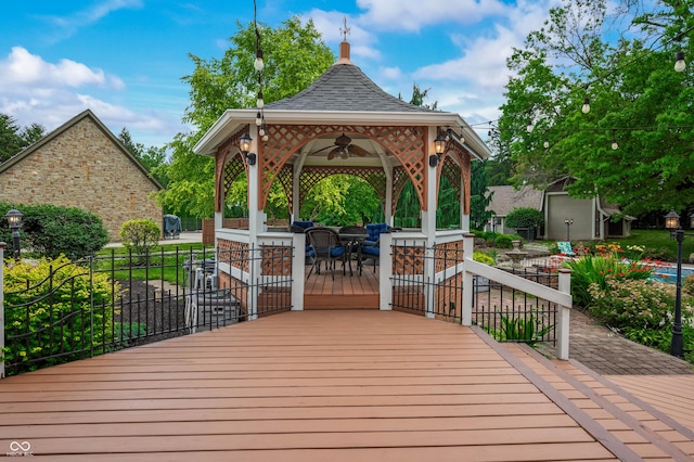 115 Jordan Rd, Indianapolis, IN 46217 - wooden deck with a gazebo and a ceiling fan