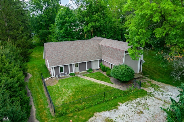 115 Jordan Rd, Indianapolis, IN 46217 - view of front of property featuring a shingled roof and a garage
