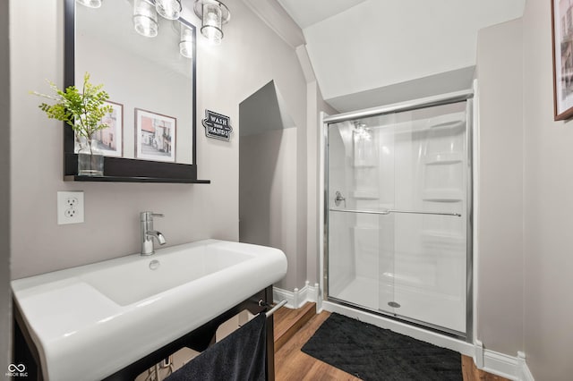 115 Jordan Rd, Indianapolis, IN 46217 - full bath featuring a shower stall and wood finished floors