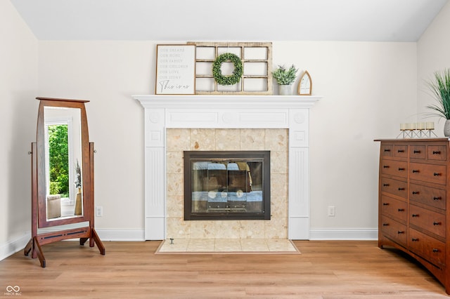 115 Jordan Rd, Indianapolis, IN 46217 - detailed view of wood finished floors and a tiled fireplace