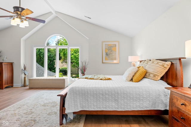 115 Jordan Rd, Indianapolis, IN 46217 - bedroom featuring wood finished floors, vaulted ceiling, and a ceiling fan
