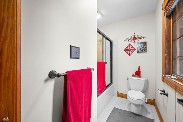115 Jordan Rd, Indianapolis, IN 46217 - full bath featuring tile patterned flooring and bath / shower combo with glass door