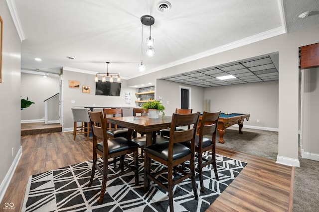 115 Jordan Rd, Indianapolis, IN 46217 - dining area with wood finished floors, pool table, ornamental molding, and stairs