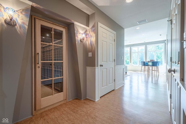 13299 W Wildflower Dr, Columbus, IN 47201 - corridor featuring light wood finished floors and recessed lighting