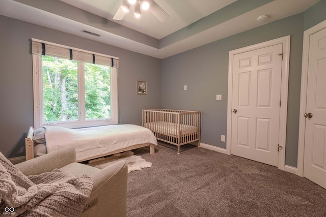 13299 W Wildflower Dr, Columbus, IN 47201 - bedroom with carpet flooring and ceiling fan