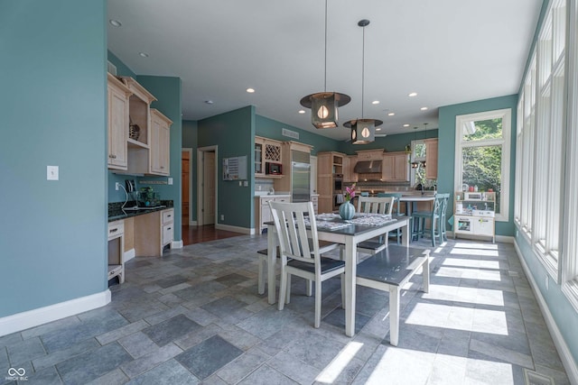 13299 W Wildflower Dr, Columbus, IN 47201 - dining area with stone tile flooring and recessed lighting