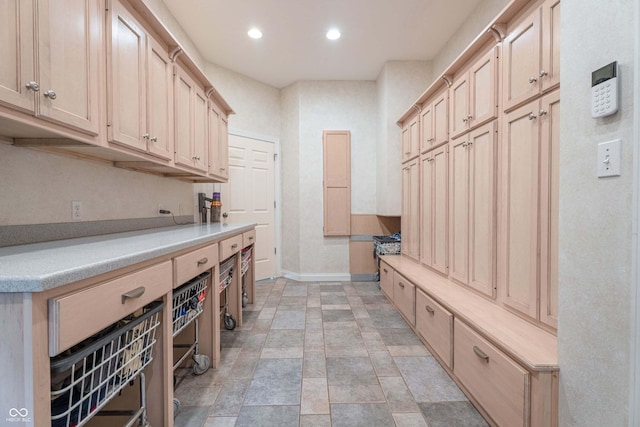 13299 W Wildflower Dr, Columbus, IN 47201 - mudroom featuring recessed lighting and light stone finish flooring