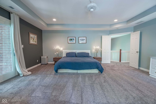 13299 W Wildflower Dr, Columbus, IN 47201 - bedroom featuring carpet floors, a tray ceiling, recessed lighting, and ceiling fan