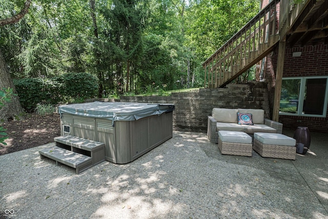13299 W Wildflower Dr, Columbus, IN 47201 - view of patio / terrace featuring a hot tub, an outdoor hangout area, stairway, and a view of trees