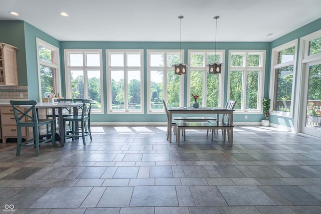 13299 W Wildflower Dr, Columbus, IN 47201 - dining room with recessed lighting and dark stone finish flooring