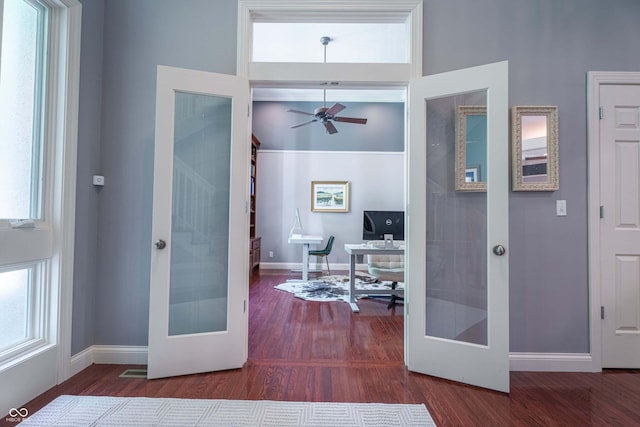 13299 W Wildflower Dr, Columbus, IN 47201 - entryway with french doors, wood finished floors, plenty of natural light, and ceiling fan