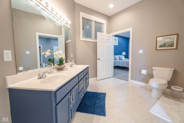 13299 W Wildflower Dr, Columbus, IN 47201 - full bath featuring ensuite bath, double vanity, and tile patterned floors