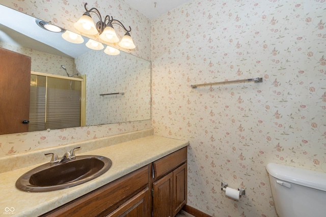 4823 Tempe Ct, Indianapolis, IN 46241 - bathroom with vanity, a shower stall, and wallpapered walls
