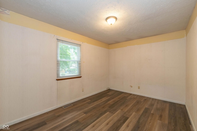 4823 Tempe Ct, Indianapolis, IN 46241 - unfurnished room featuring wood finished floors and a textured ceiling