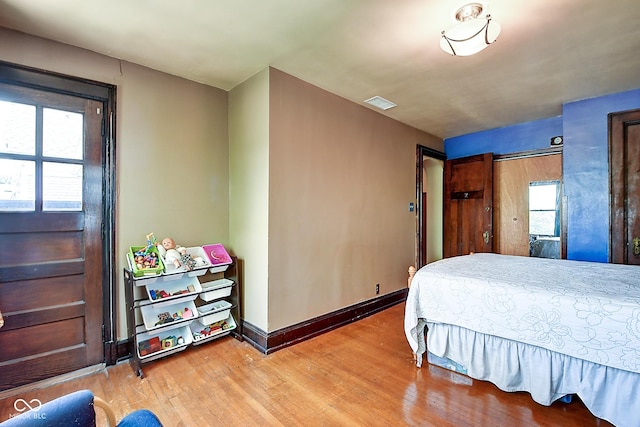 1934 N New Jersey St, Indianapolis, IN 46202 - bedroom with wood finished floors and multiple windows