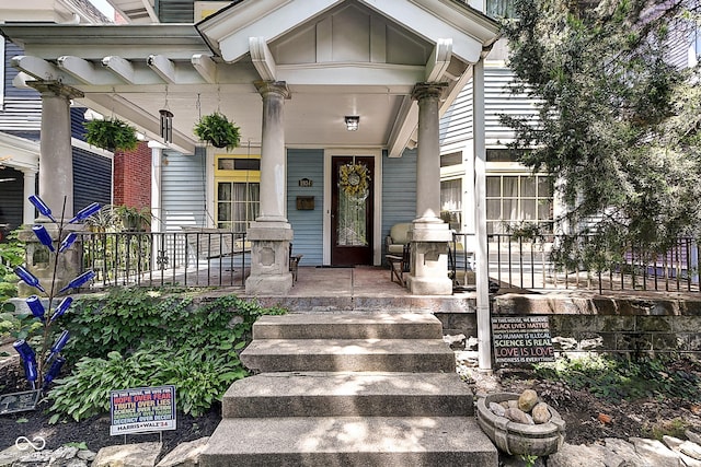 1934 N New Jersey St, Indianapolis, IN 46202 - view of exterior entry featuring a porch