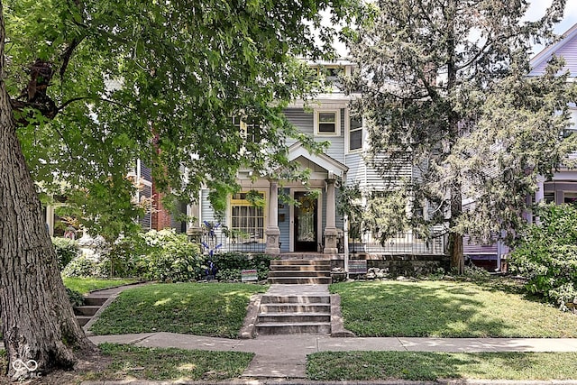 1934 N New Jersey St, Indianapolis, IN 46202 - view of property hidden behind natural elements featuring a front yard