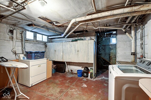 1934 N New Jersey St, Indianapolis, IN 46202 - basement featuring washing machine and dryer and a sink
