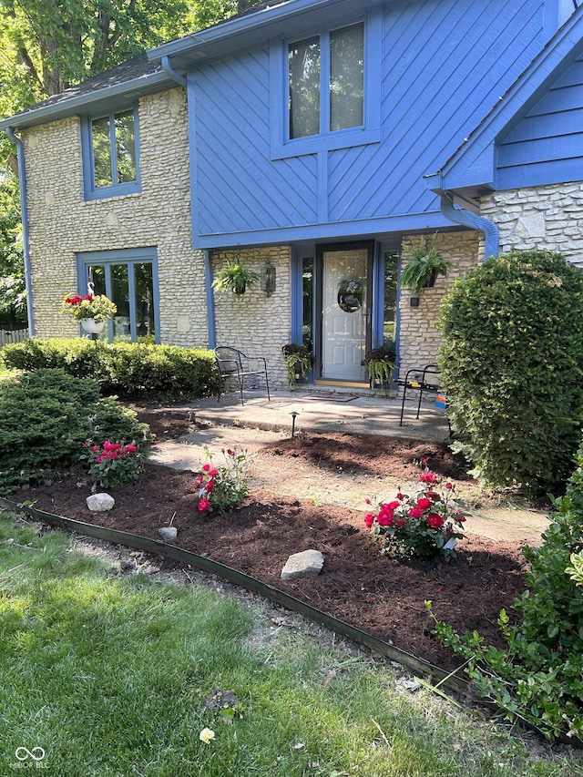 10308 Stormhaven Way, Indianapolis, IN 46256 - view of front of home featuring stone siding
