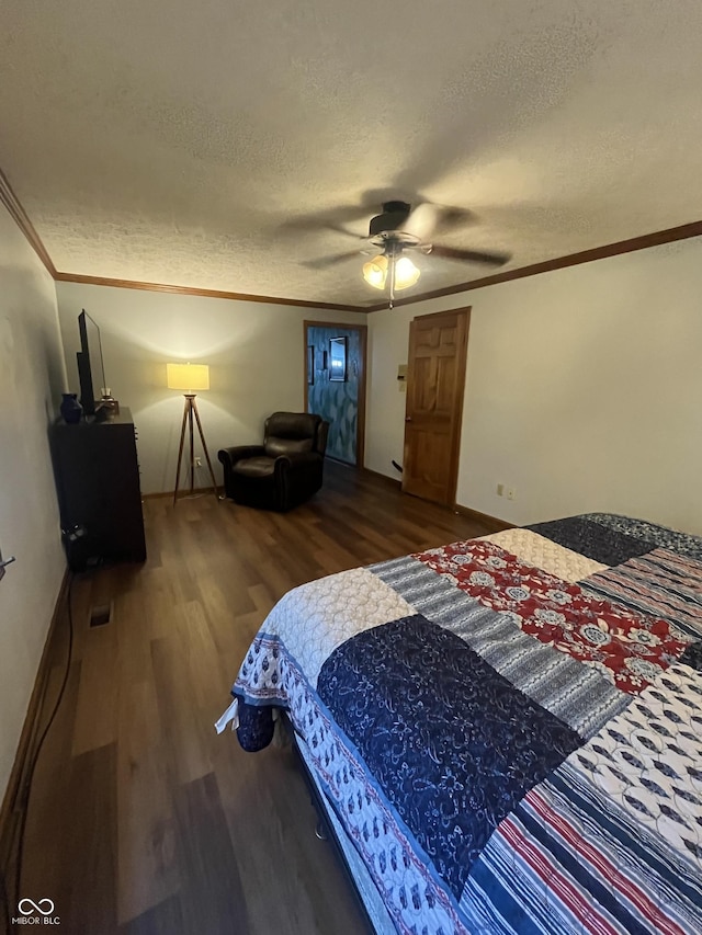 10308 Stormhaven Way, Indianapolis, IN 46256 - bedroom with wood finished floors, crown molding, a textured ceiling, and a ceiling fan