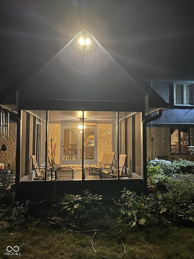 10308 Stormhaven Way, Indianapolis, IN 46256 - back of house at night featuring stone siding