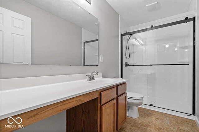 13386 Smokey Quartz Ln, Fishers, IN 46038 - bathroom with a shower stall, vanity, and tile patterned floors