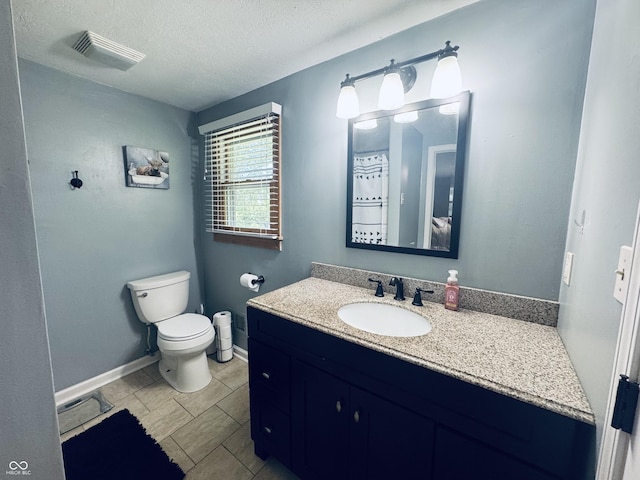 5818 N Fortville Pike, Greenfield, IN 46140 - full bath featuring vanity and a textured ceiling