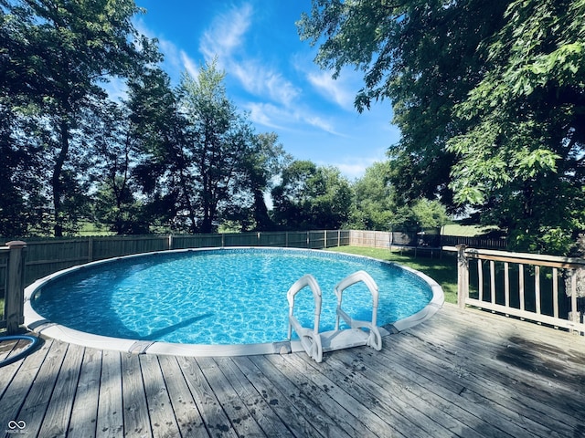 5818 N Fortville Pike, Greenfield, IN 46140 - view of swimming pool with a fenced backyard and a deck