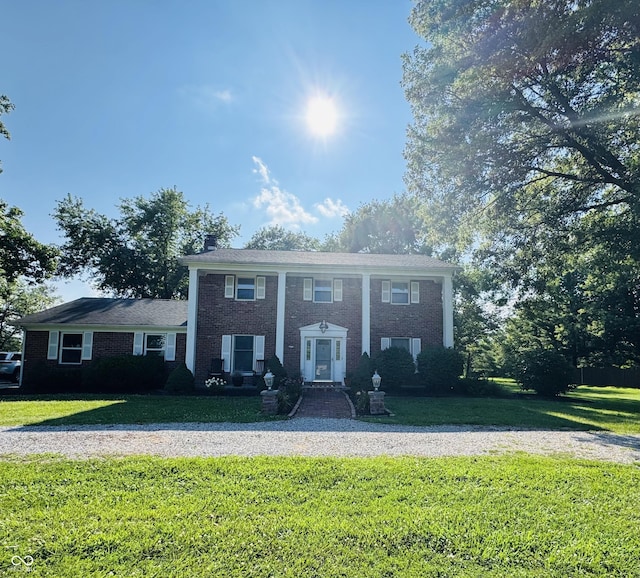5818 N Fortville Pike, Greenfield, IN 46140 - neoclassical home with a front yard and brick siding