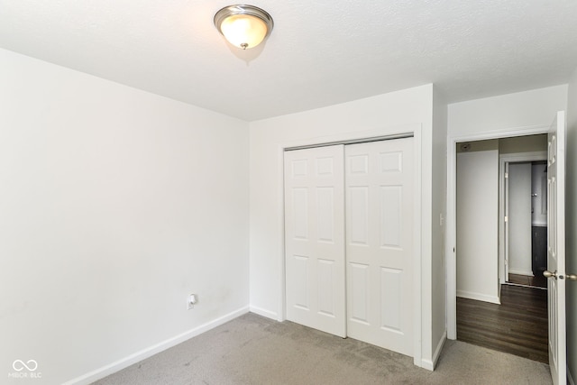 7547 Prairie Lake Dr, Indianapolis, IN 46256 - unfurnished bedroom featuring a closet and carpet flooring