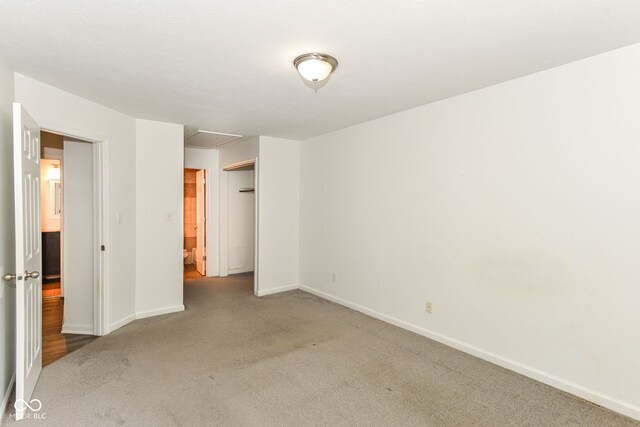 7547 Prairie Lake Dr, Indianapolis, IN 46256 - unfurnished bedroom with carpet floors and baseboards