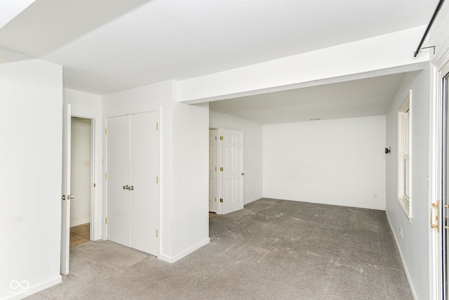 7547 Prairie Lake Dr, Indianapolis, IN 46256 - spare room with carpet flooring and baseboards