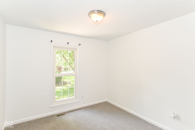 7547 Prairie Lake Dr, Indianapolis, IN 46256 - carpeted empty room featuring baseboards