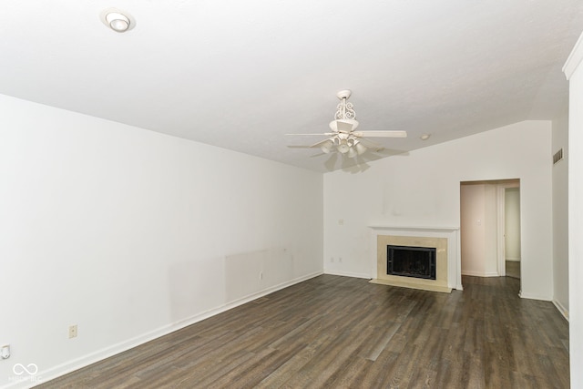7547 Prairie Lake Dr, Indianapolis, IN 46256 - unfurnished living room featuring dark wood-style flooring, a ceiling fan, and a fireplace with flush hearth