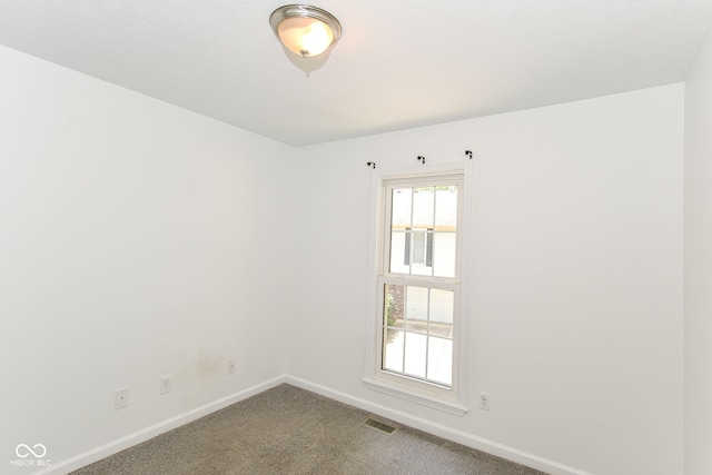 7547 Prairie Lake Dr, Indianapolis, IN 46256 - spare room featuring baseboards and carpet floors