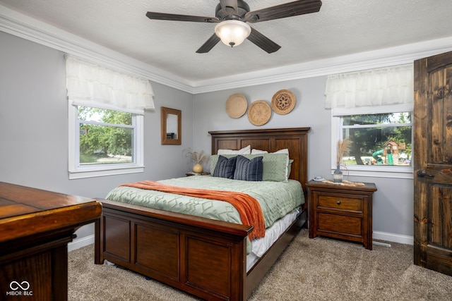 2748 S Meridian Rd, Greenfield, IN 46140 - bedroom with light carpet, ornamental molding, and a ceiling fan
