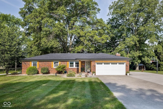2748 S Meridian Rd, Greenfield, IN 46140 - single story home with an attached garage, driveway, brick siding, and a front lawn