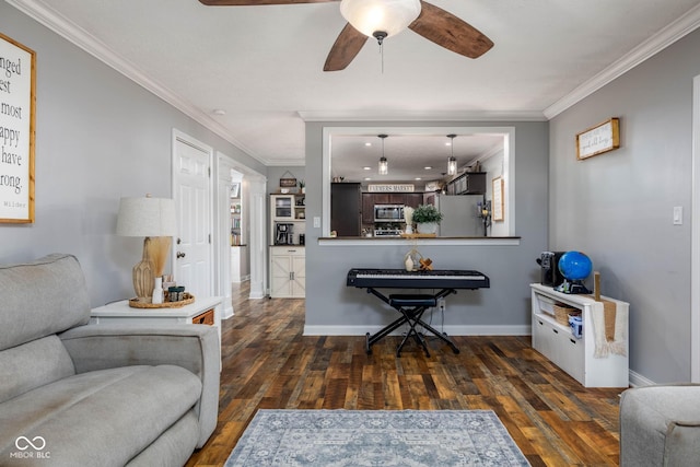 2748 S Meridian Rd, Greenfield, IN 46140 - living area with dark wood-style flooring, crown molding, and a ceiling fan