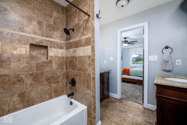 2748 S Meridian Rd, Greenfield, IN 46140 - bathroom featuring vanity, connected bathroom,  shower combination, and ceiling fan