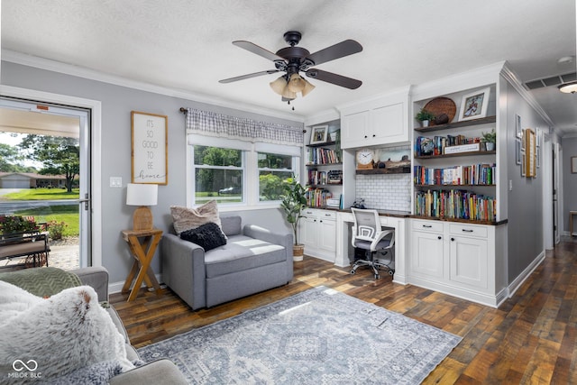 2748 S Meridian Rd, Greenfield, IN 46140 - home office with built in desk, crown molding, ceiling fan, and dark wood-type flooring
