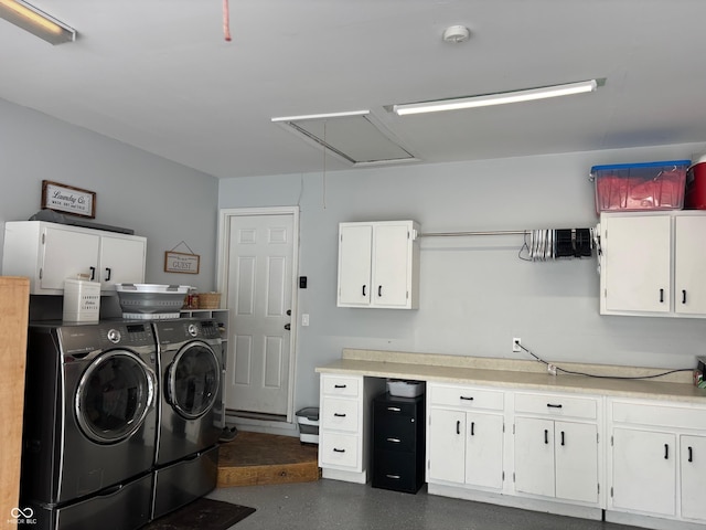 2748 S Meridian Rd, Greenfield, IN 46140 - laundry room with washer and dryer, cabinet space, and attic access