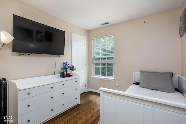 9751 Roxbury Dr, Fishers, IN 46038 - bedroom with dark wood-type flooring and baseboards