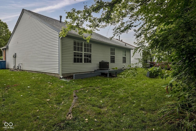 9751 Roxbury Dr, Fishers, IN 46038 - view of home's exterior featuring a yard and roof with shingles